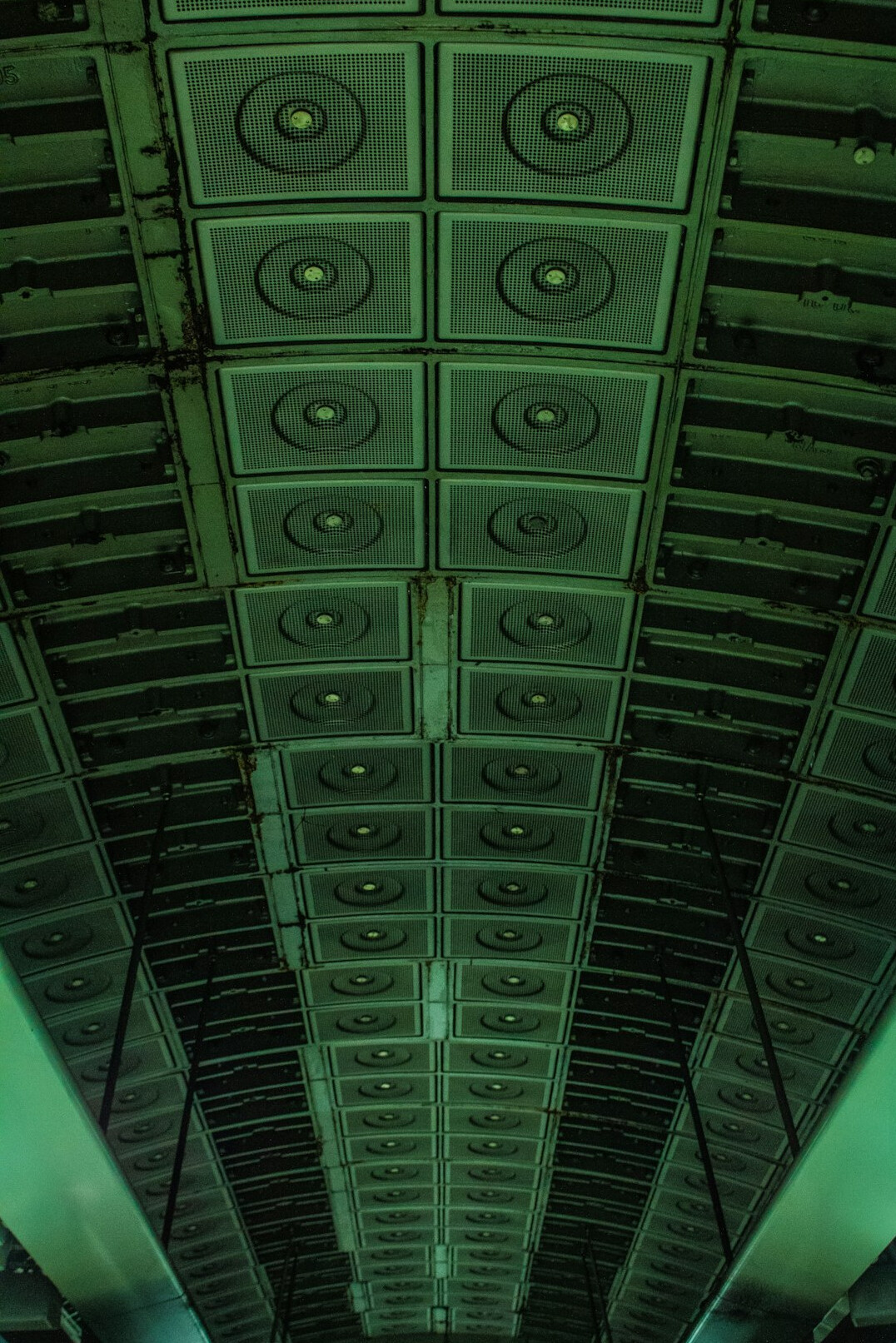 Server racks in a data center with blue lighting